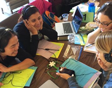 Four teacher scholars look at video data of student learning